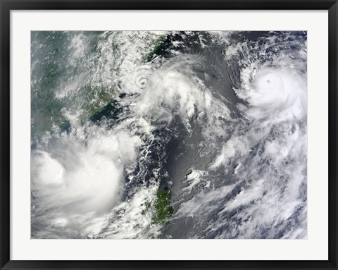 Framed Three Strong Storms Churn in the Pacific Ocean Basin off the Asian coast Print