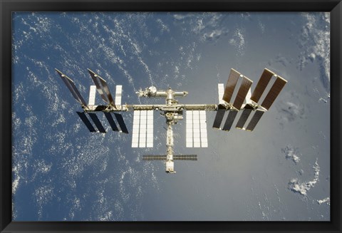 Framed International Space Station Backdropped against Earth Print