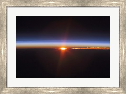 Framed Layers of Earth&#39;s atmosphere, brightly colored as the sun sets over South America Print