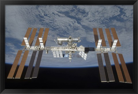 Framed International Space Station, Backdropped by the blackness of space and Earth&#39;s horizon Print