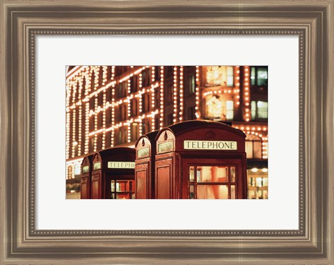 Framed Lit Telephone booth at Harrods, Knightsbridge, London, England Print