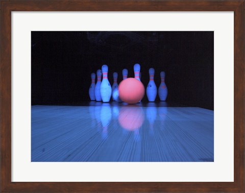 Framed Bowling ball with bowling pins Print