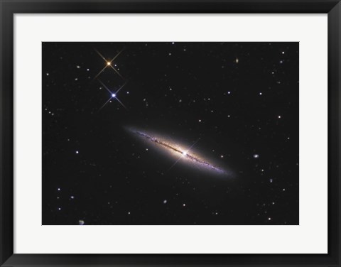 Framed NGC 4013 is an edge-on unbarred spiral galaxy in the Constellation Ursa Major Print