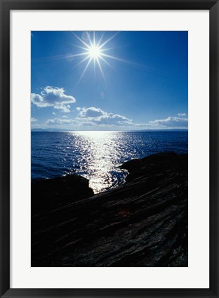 Framed Sunstar Over Yellowstone Lake Print