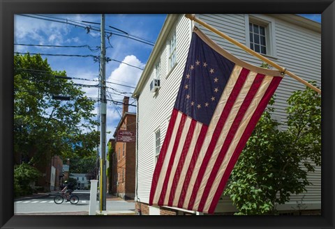 Framed New Hampshire, Portsmouth, Strawberry Banke Historic Area, building with US flag Print