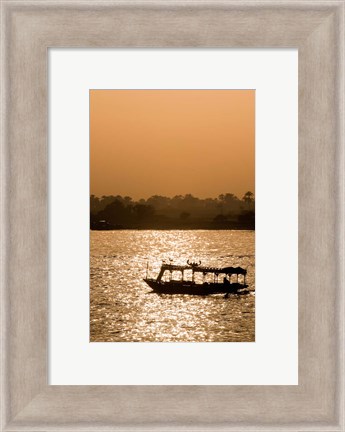 Framed Egypt, Luxor Water taxi at sunset Nile River Print