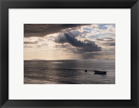 Framed Dramatic light over a little boat, Mamanucas Islands, Fiji, South Pacific Print