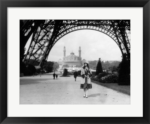 Framed 1920s Woman Walking Under The Eiffel Tower Print