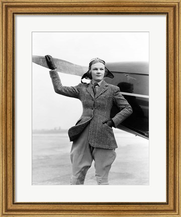 Framed 1930s Woman Aviator Pilot Standing Next To Airplane Print