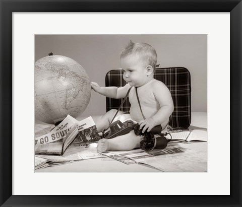 Framed 1960s Baby Seated Looking At Globe Print