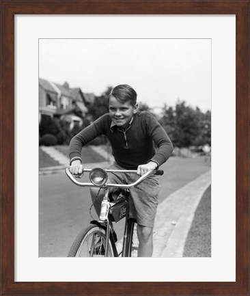 Framed 1930s Smiling Boy Riding Bicycle Print