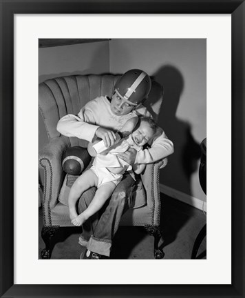 Framed 1950s 1960s Boy Sitting By Football Print