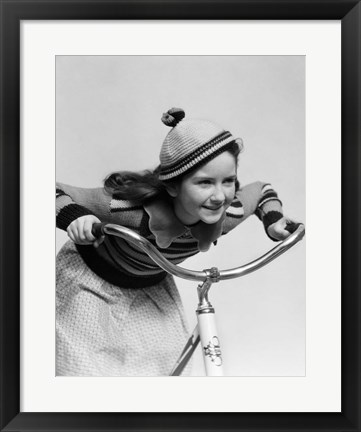 Framed 1930s Smiling Eager Little Girl In Knit Cap And Sweater Riding Bike Print