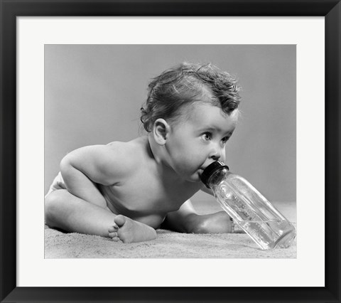 Framed 1950s Baby Leaning Forward Drinking From Bottle Print