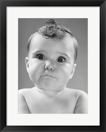 Framed 1950s Baby Making Funny Face With Eyes Wide Open Print