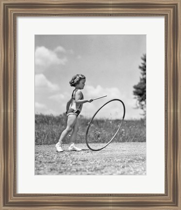 Framed 1930s Girl Outdoors Playing Hoop And Stick Game Print